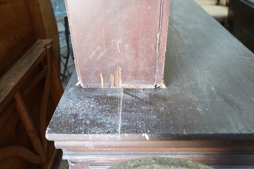 A 19th century Continental pine three door buffet with associated mahogany top, length 143cm, depth 67cm, height 196cm